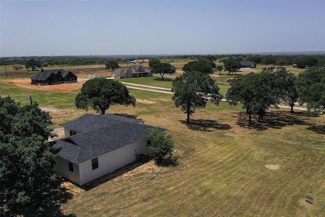 birds eye view of property featuring a rural view