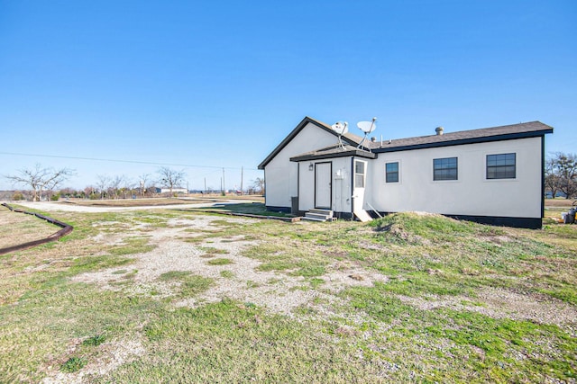 back of property with entry steps