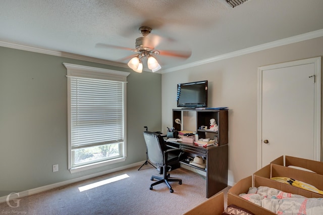 carpeted bedroom with ceiling fan, a textured ceiling, baseboards, and ornamental molding