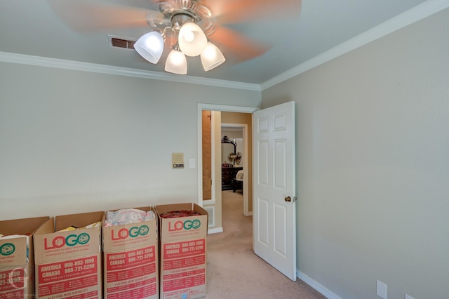 interior space featuring visible vents, baseboards, and ornamental molding