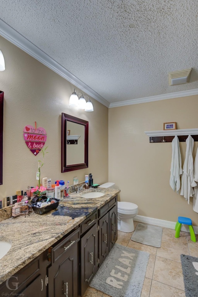 full bathroom featuring a textured ceiling, ornamental molding, vanity, and toilet