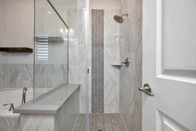 full bathroom with a shower stall