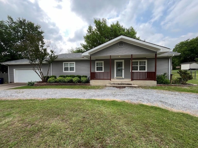 751 E Cooper St, Van Alstyne, TX 75495 - single story home featuring driveway, covered porch, a front lawn, and a garage