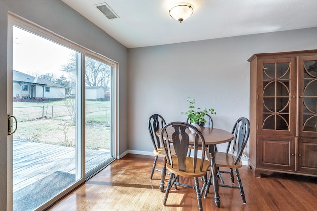 751 E Cooper St, Van Alstyne, TX 75495 - dining space with wood finished floors and baseboards