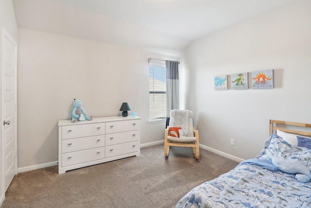 bedroom with baseboards, carpet, and vaulted ceiling