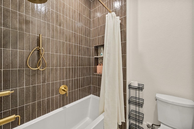 bathroom with shower / bathtub combination with curtain and toilet