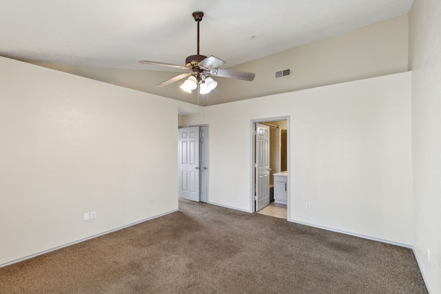 unfurnished room featuring visible vents, light carpet, and a ceiling fan