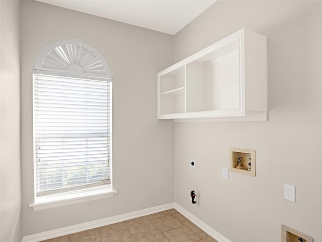 clothes washing area featuring washer hookup, laundry area, baseboards, and hookup for an electric dryer