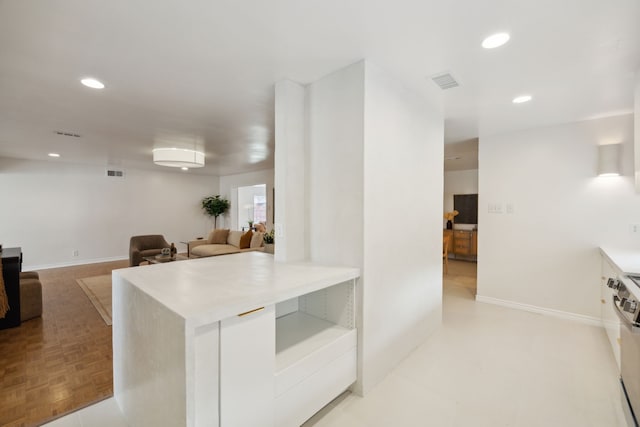 kitchen with visible vents, recessed lighting, and light countertops