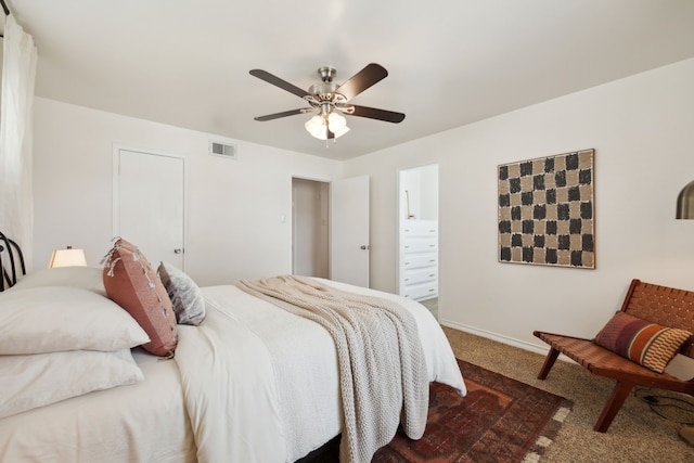 carpeted bedroom featuring visible vents, baseboards, and a ceiling fan