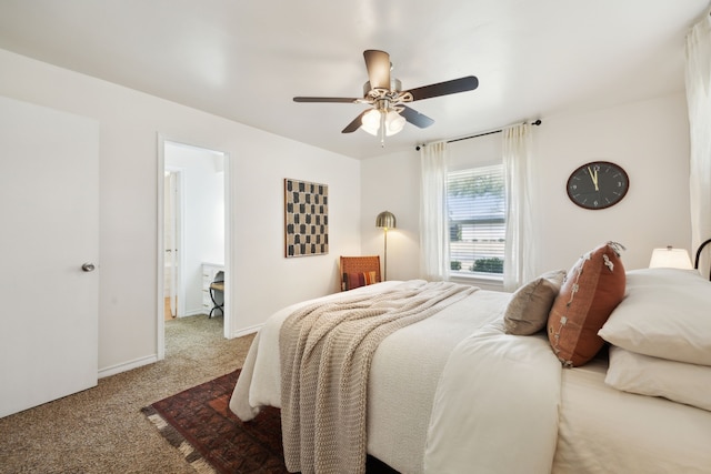 carpeted bedroom featuring ceiling fan and baseboards