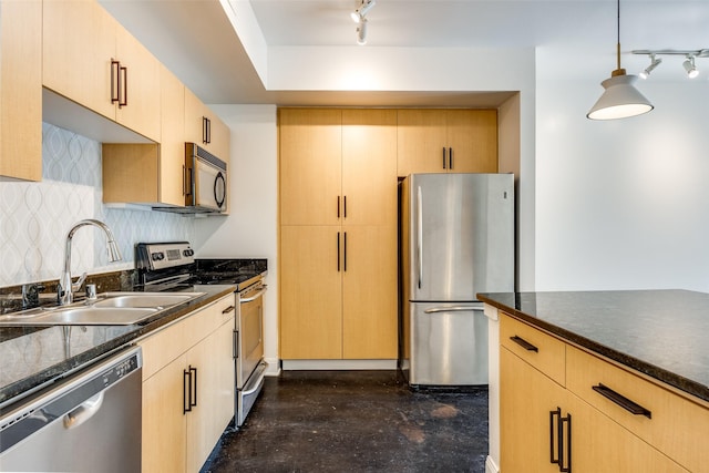 kitchen with tasteful backsplash, light brown cabinets, dark stone countertops, stainless steel appliances, and a sink