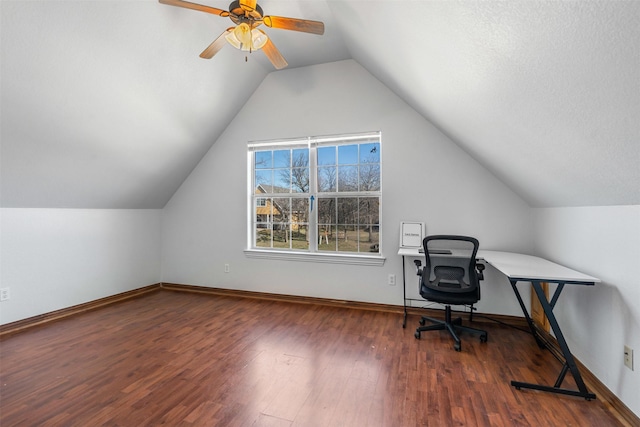 unfurnished office with baseboards, a ceiling fan, lofted ceiling, and wood finished floors