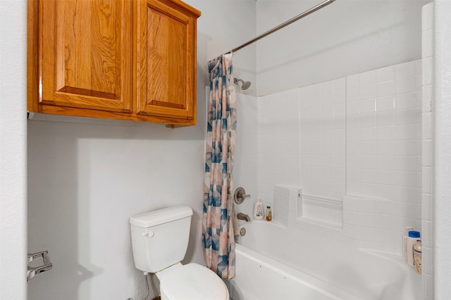 bathroom featuring toilet and shower / bath combo with shower curtain