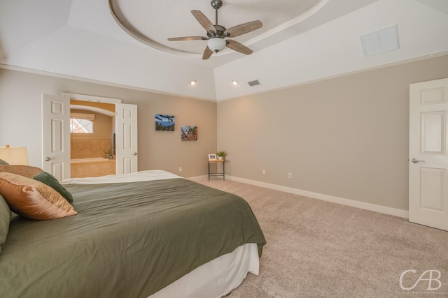 bedroom featuring visible vents, baseboards, light colored carpet, and vaulted ceiling