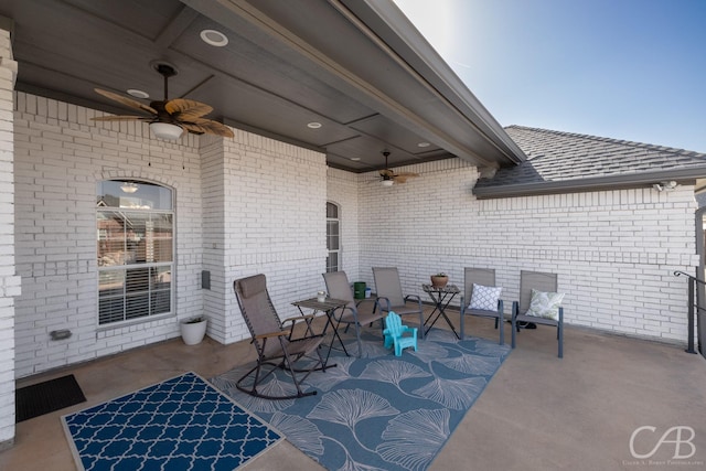 view of patio / terrace featuring a ceiling fan