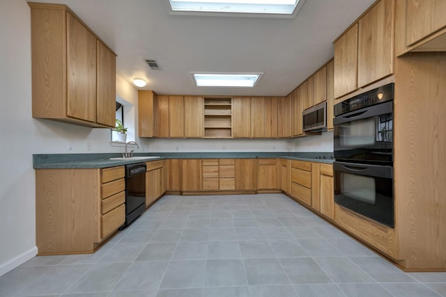 kitchen featuring visible vents, black appliances, a sink, open shelves, and dark countertops