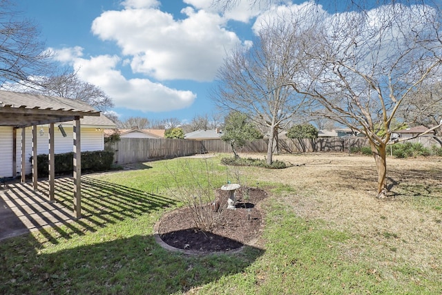 view of yard featuring a fenced backyard and a pergola