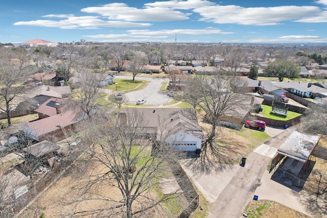 birds eye view of property with a residential view