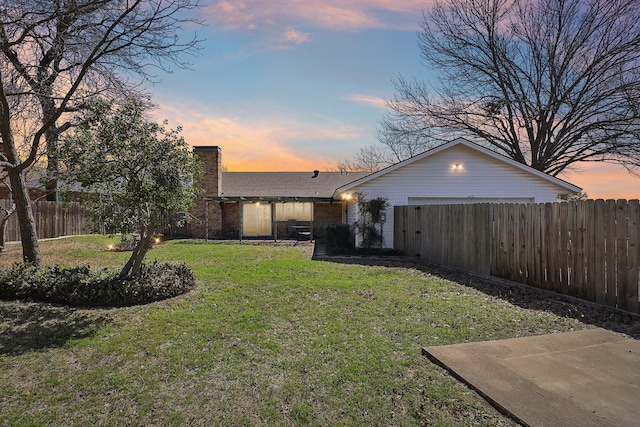 yard at dusk with fence