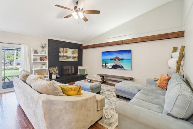 living room featuring ceiling fan, lofted ceiling, and wood finished floors