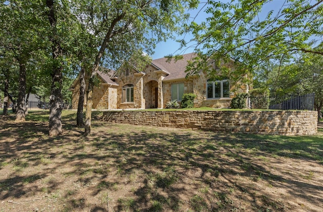 712 S Sugartree Dr, Lipan, TX 76462 - traditional-style home featuring stone siding