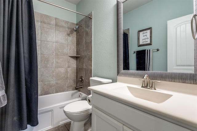 bathroom featuring vanity, shower / bath combination with curtain, toilet, and a textured wall