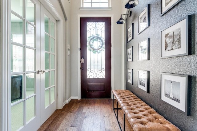 foyer with hardwood / wood-style floors