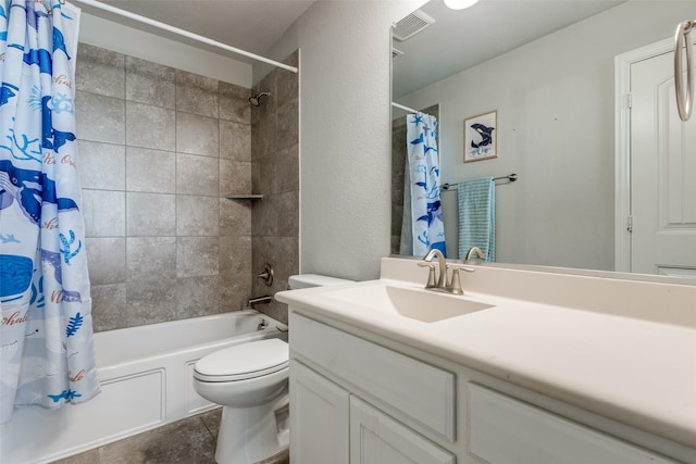 full bathroom featuring visible vents, shower / bathtub combination with curtain, toilet, vanity, and a textured wall