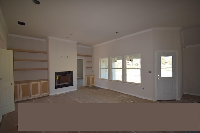 unfurnished living room with visible vents, baseboards, a fireplace, and crown molding