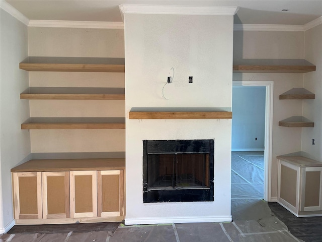 room details with crown molding, a fireplace, and baseboards