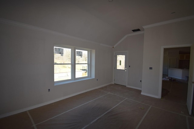 empty room with visible vents, lofted ceiling, baseboards, and crown molding