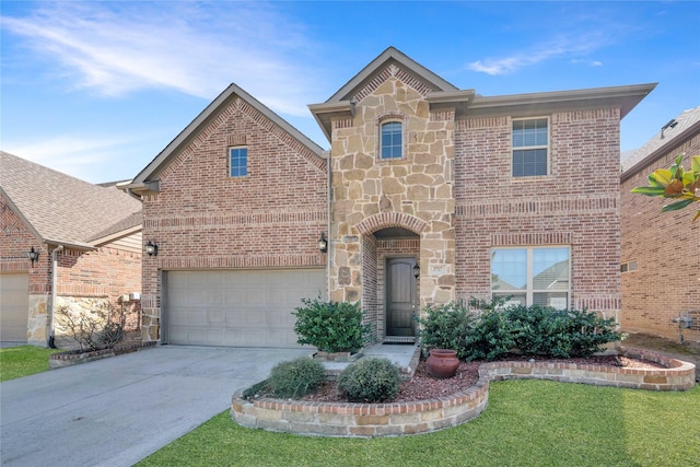 traditional home featuring a front lawn, brick siding, stone siding, and driveway