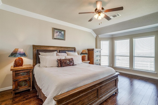 bedroom featuring visible vents, ceiling fan, baseboards, ornamental molding, and dark wood-style flooring