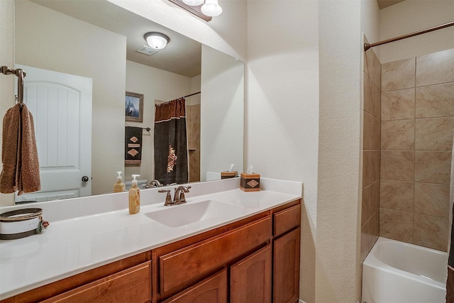 bathroom featuring vanity and visible vents