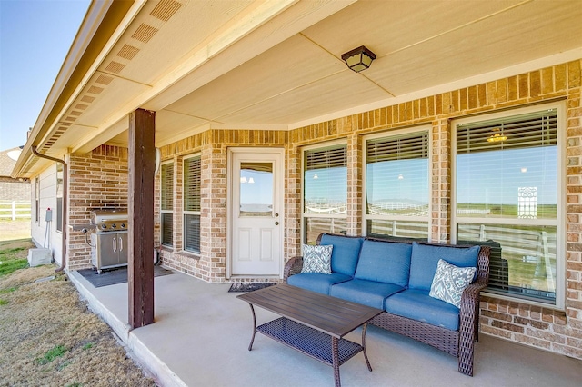 view of patio / terrace with a grill and outdoor lounge area