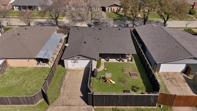 birds eye view of property with a residential view