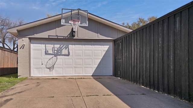 garage with fence