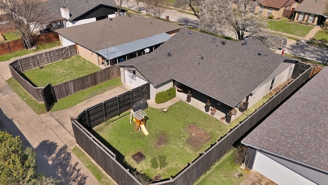 birds eye view of property with a residential view