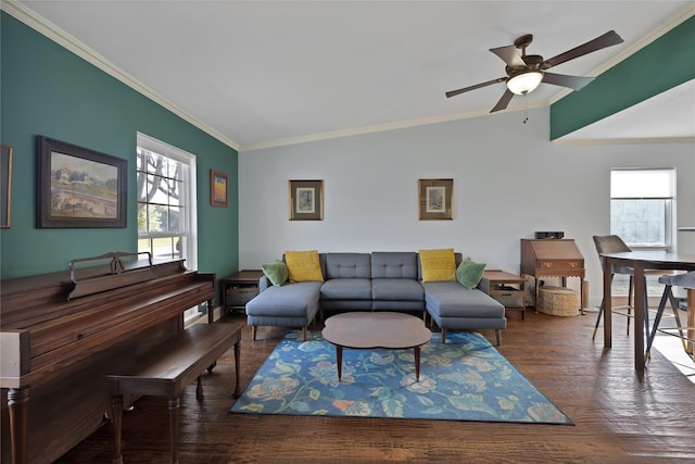 living area featuring ceiling fan, crown molding, lofted ceiling, and wood finished floors