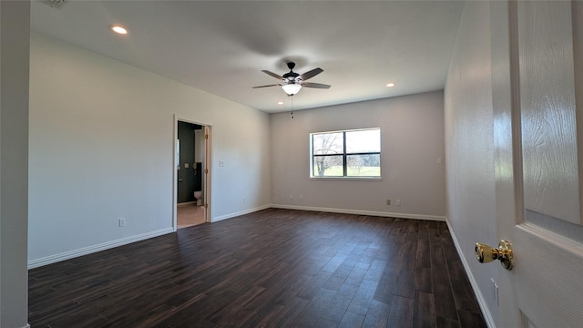 spare room with recessed lighting, baseboards, dark wood finished floors, and a ceiling fan