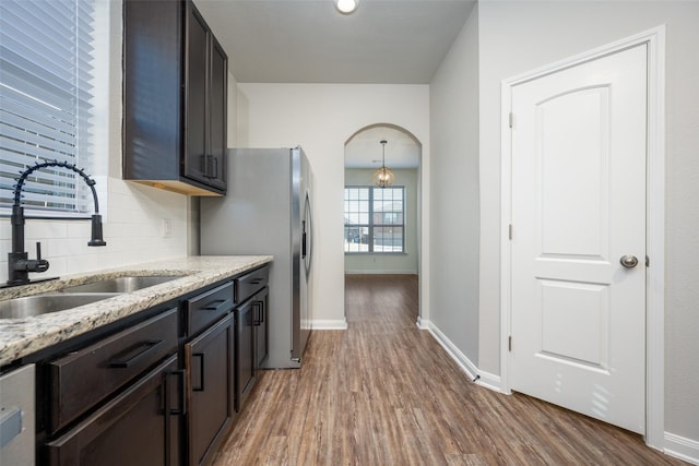 900 Juneberry Dr, Denton, TX 76207 - full bathroom featuring visible vents, a garden tub, wood finished floors, baseboards, and vanity