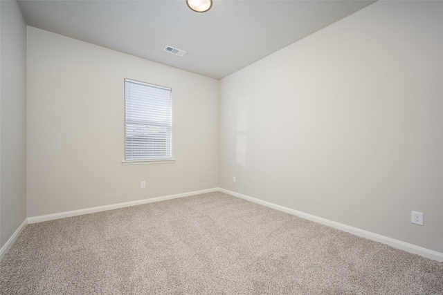 900 Juneberry Dr, Denton, TX 76207 - empty room featuring visible vents, baseboards, and carpet