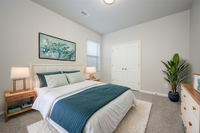 900 Juneberry Dr, Denton, TX 76207 - bedroom with carpet flooring, baseboards, and visible vents