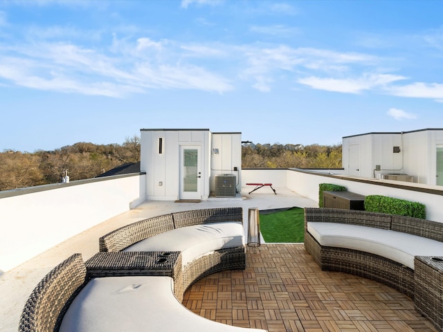 view of patio with an outdoor living space and cooling unit