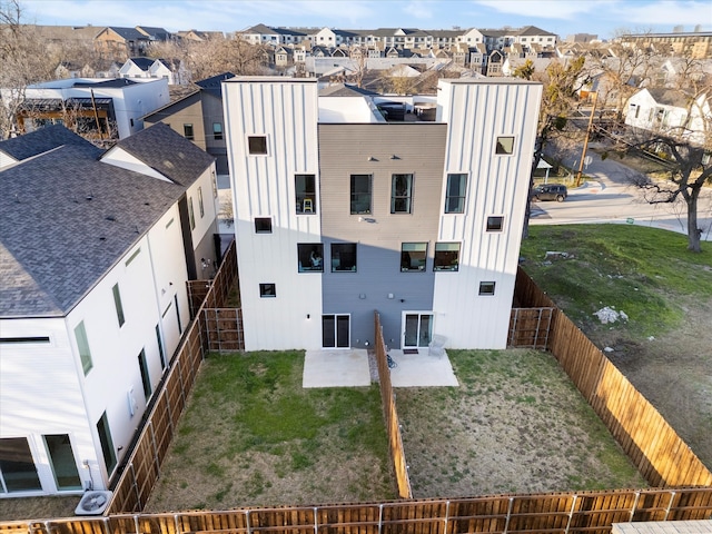 birds eye view of property with a residential view