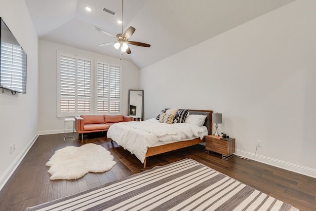 bedroom featuring visible vents, ceiling fan, baseboards, lofted ceiling, and wood finished floors