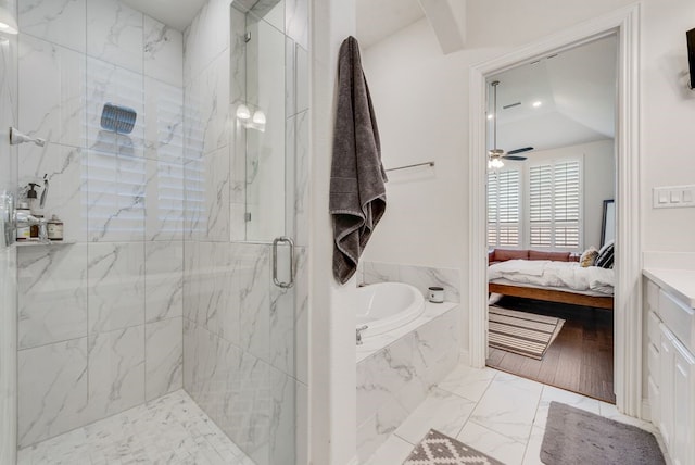 ensuite bathroom featuring a marble finish shower, ceiling fan, a bath, marble finish floor, and ensuite bath