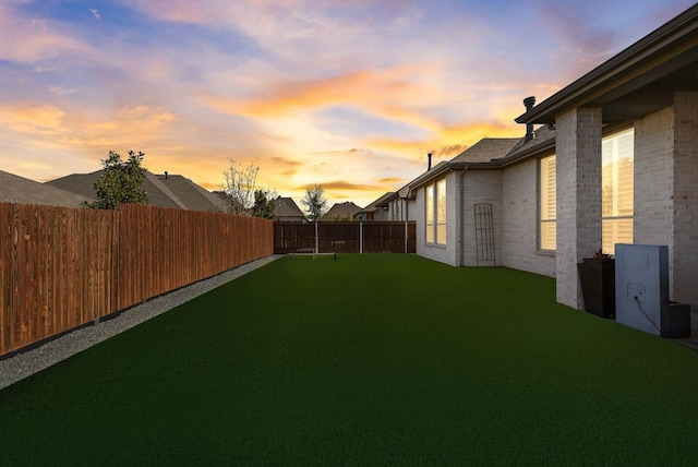 view of yard featuring a fenced backyard