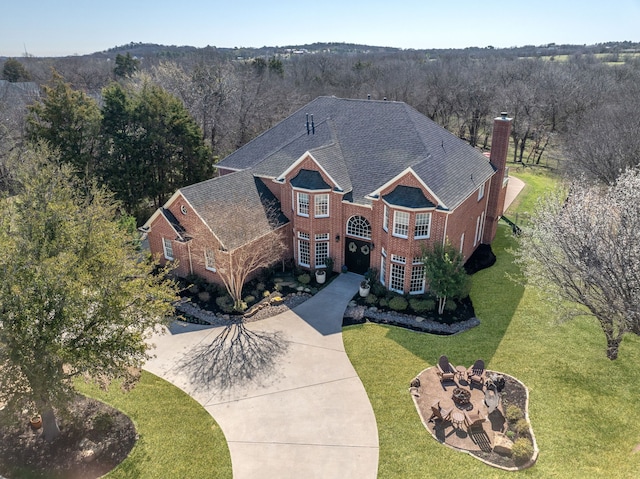 aerial view with a wooded view